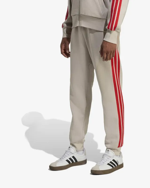 Pantalón largo adidas Essentials Fleece 3 Stripes beige - S