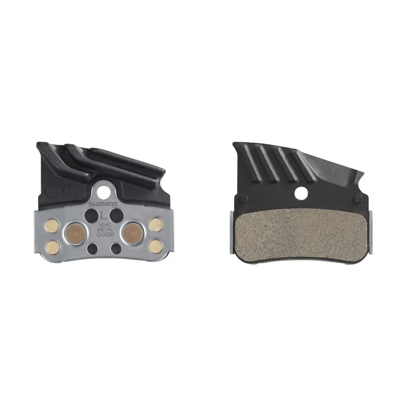 Par de zapatas metálicas para frenos de bicicleta con aleta y muelle Shimano N04C-MF